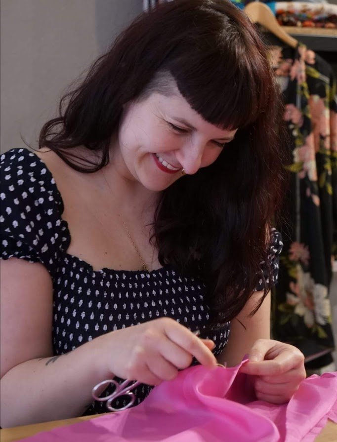 girl sewing portrait